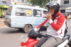 Merokok Saat Berkendara Kini Terancam Denda Hingga 750 Ribu